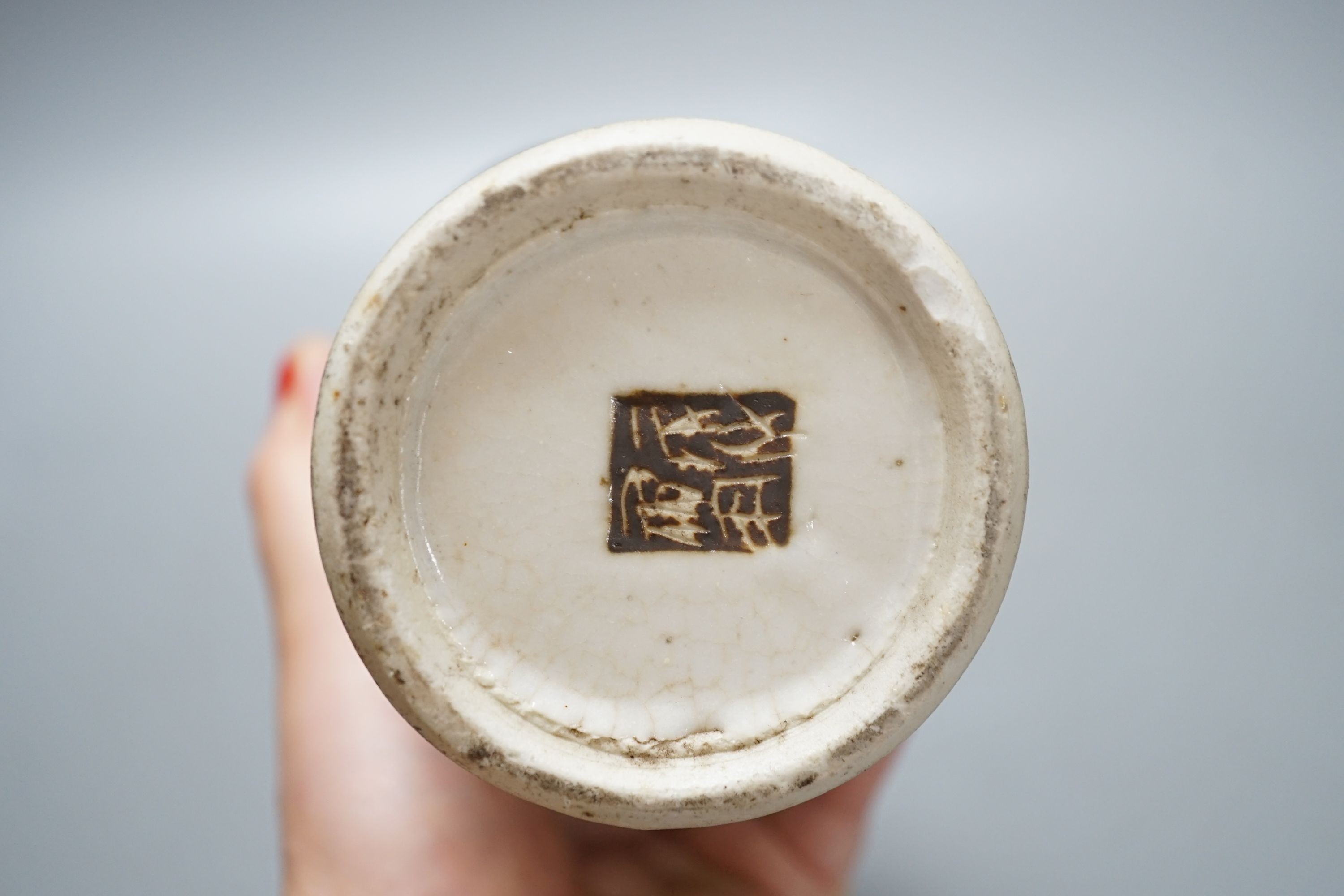 A Chinese blue and white crackle ware vase, c.1900, 22cms high including cover.